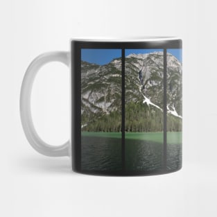 The fabulous alpine lake of Landro (Durrensee) in the Dolomites (Dobbiaco). Lovely place in the Italian Alps. Reflections in the water. Sunny spring day. Trentino Alto Adige Mug